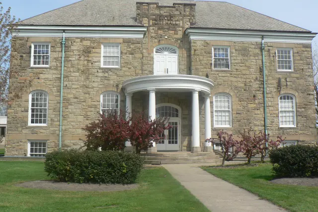 Euclid's Old City Hall, a stone building with a columned entrance, in Euclid, Ohio